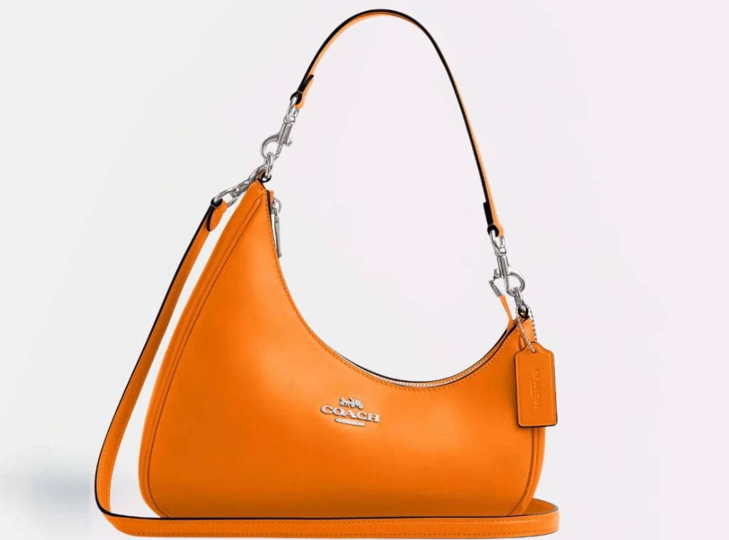 9f9d71a4-d2c2-47b1-b6a2-0d7c49ed8994_1758133645 SHOP This Pumpkin Orange Coach Bag Is Everything and It’s on Sale