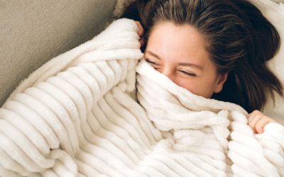 The Coziest Fleece Blankets to Keep You Warm All Fall: Amazon, Walmart, Quince, Barefoot Dreams & More