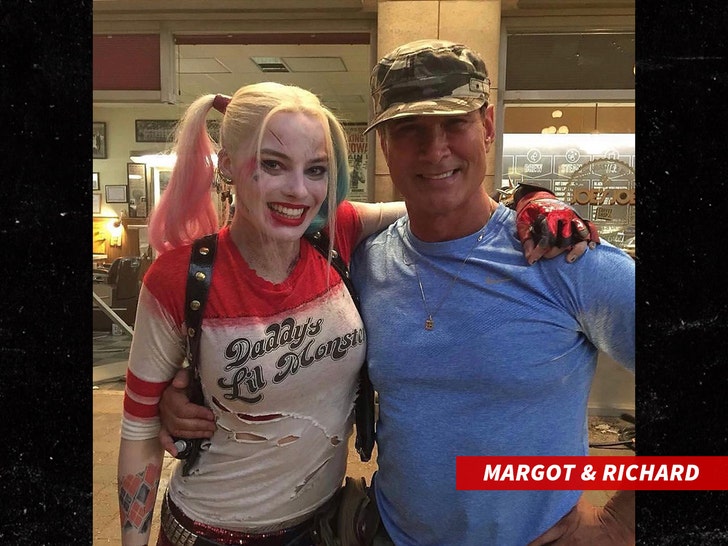 Richard Norton and Margot Robbie