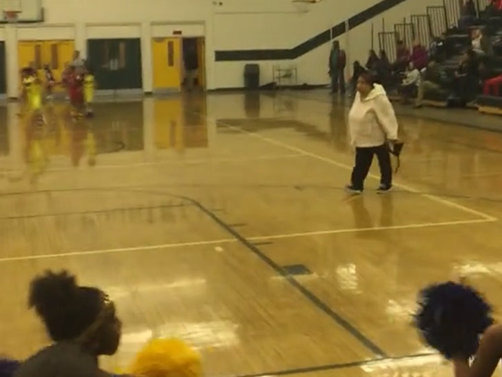 08ba0c5c88d648b68f9bb81e59cb3925_md 032825-woman-basketball-court-1