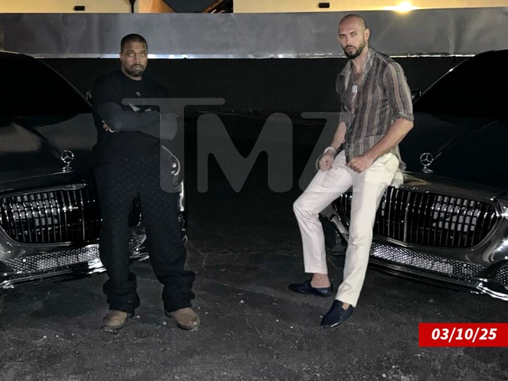 136c06cc0b194f3684a4ec3ea7989032_md kanye west andrew tate