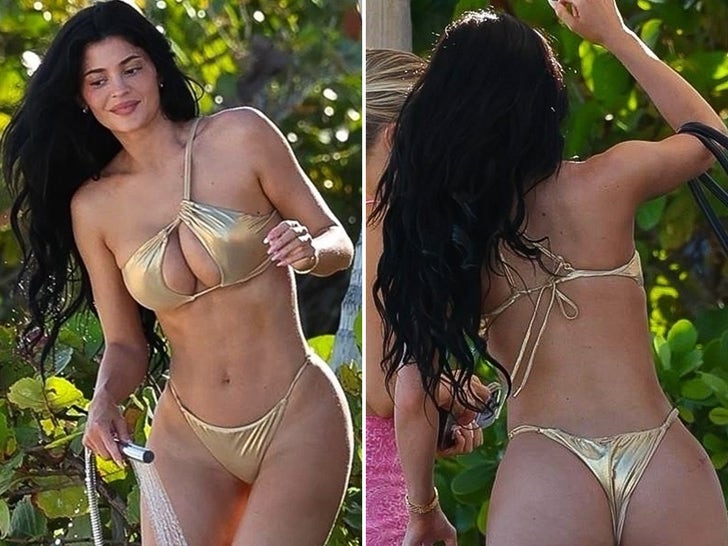 1c5a9cca7ac7419d9375ed68b957cad5_md Kylie Jenner Sizzles In Gold Bikini During Beach Day