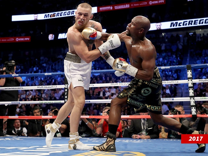 21ca9796f1d342768729985b3d5a9419_md floyd mayweather and conor mcgregor