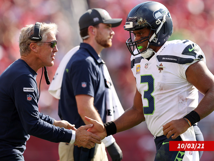 2a290be04ad74c2196b2583a0261d18e_md russell wilson and pete carroll