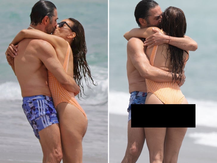 4adeae31c71544128765aa8e9b0d92e3_md Eva Longoria and Hot Hubby Kissing On Beach