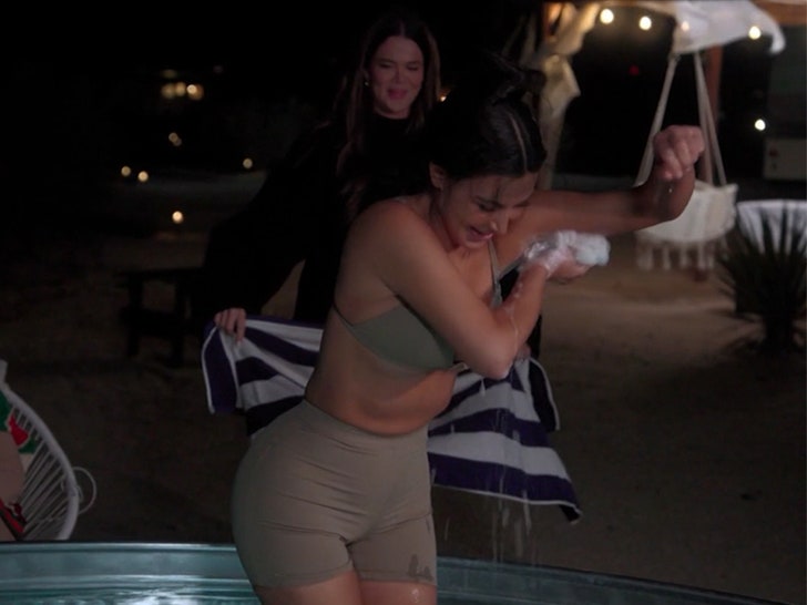 040325-kim-kardashian-bathing-v3