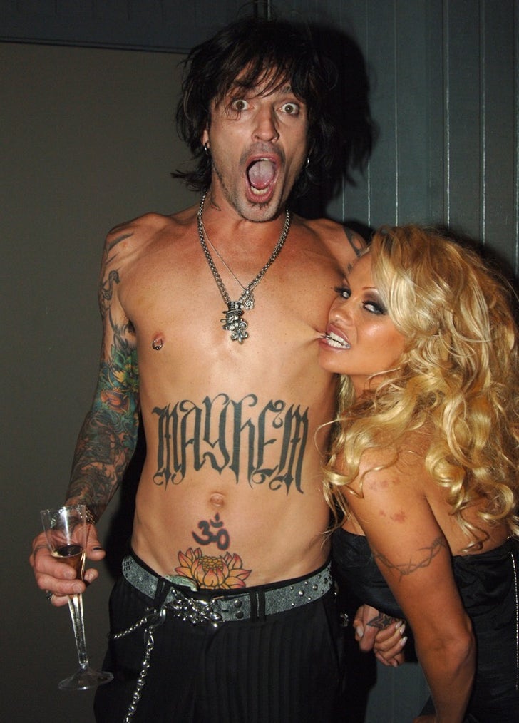 58364eefd1765fe494aed0f64ff4851d_md Tommy Lee and Pamela Anderson -- Happier Times