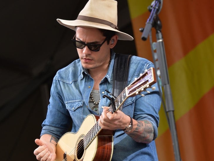 5ac02cb3fa07582f9940683bb29347f6_md John Mayer Performance Photos