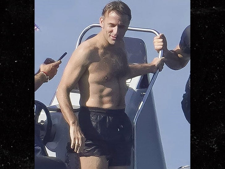 French President Emmanuel Macron Displays Washboard Abs On Summer Getaway