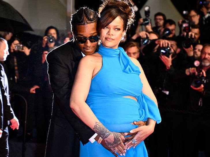6c566142f5f54900b1399da4c42f4715_md-1 A$AP Rocky Hugs Rihanna's Pregnant Belly On Cannes Film Festival Red Carpet