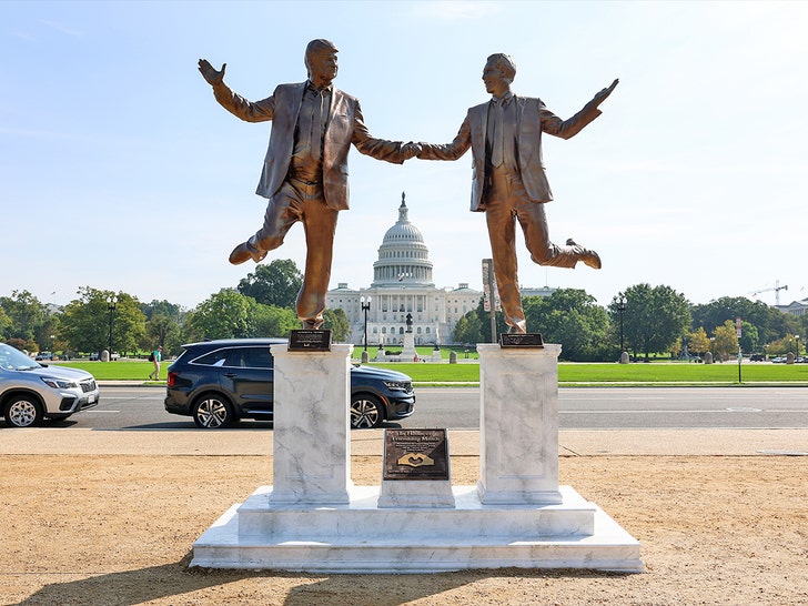 donald trump and jeffrey epstein statue getty 1