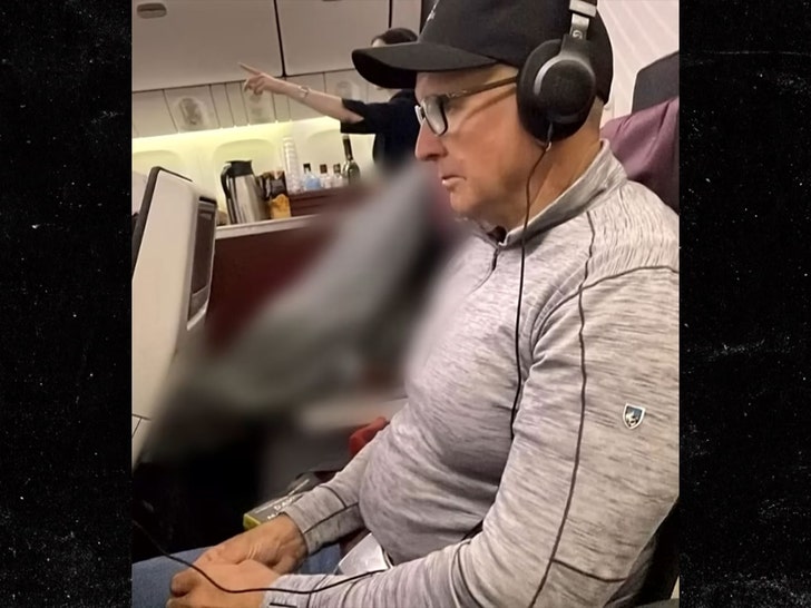820c617e50524624a8c687c8fd1d5d76_md man sits by dead body on plane 1
