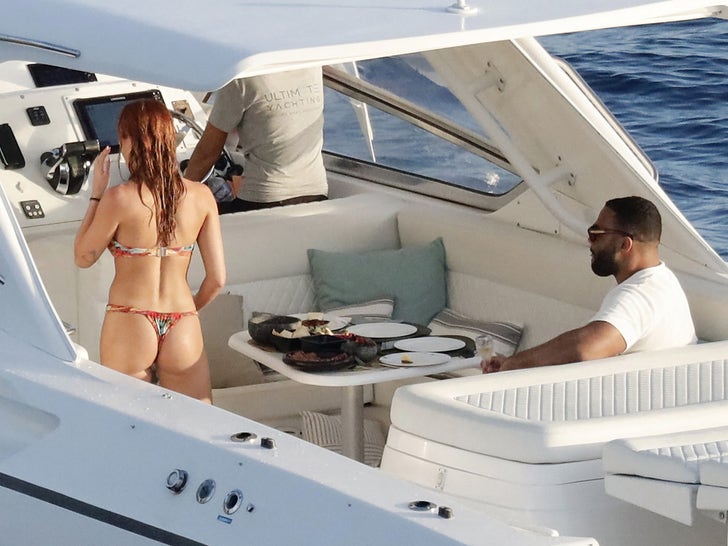 85947cda14ef4140977f187930ec9e90_md 0224-Solomon-Thomas-Kaylie-Alyson-Kissing-Yacht-St-Barts-photos-primary-2
