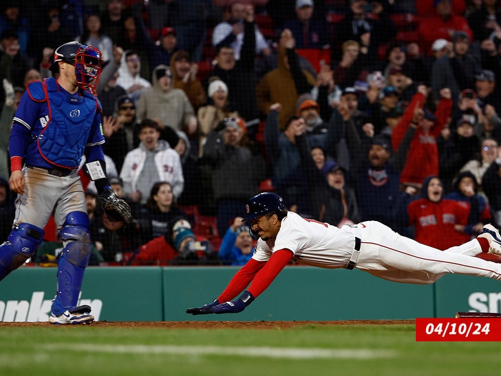 David Hamilton Boston Red Sox dives home with the winning run