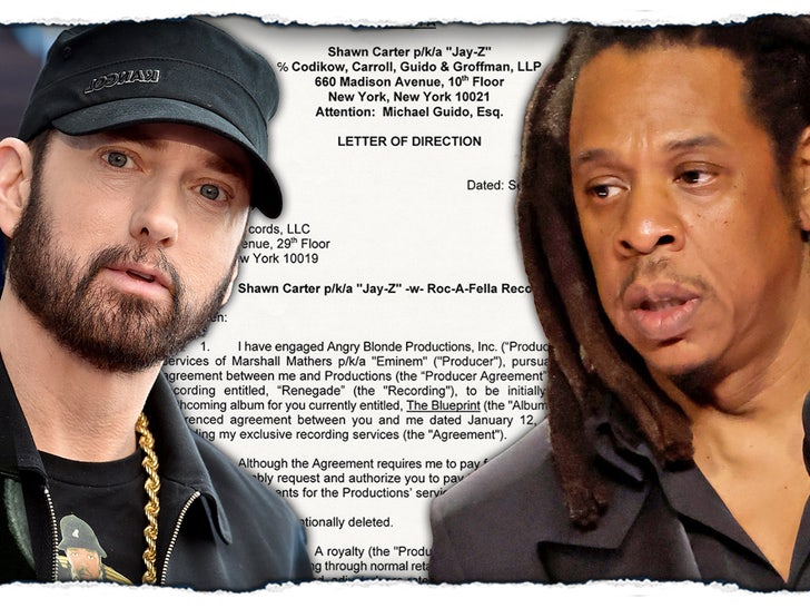 8c36a602459f4238a38057ea7f764c3a_md eminem jay z signatures moments in time launch.