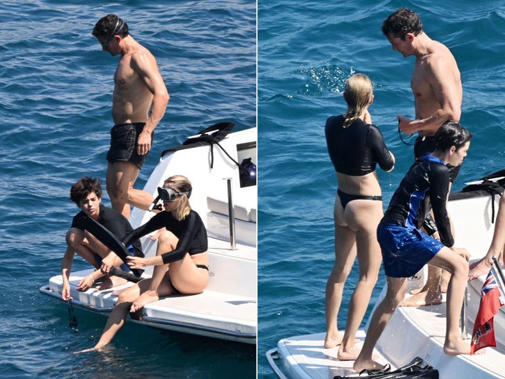 Orlando Bloom goes snorkeling with son Flynn and mystery woman
