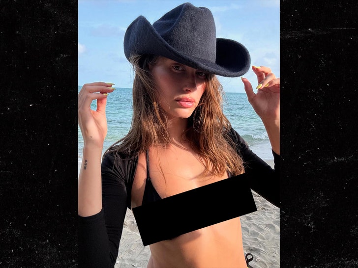 a1fd67e729fd43518f79f424a1c00449_md Hailey Bieber in a Black Bikini