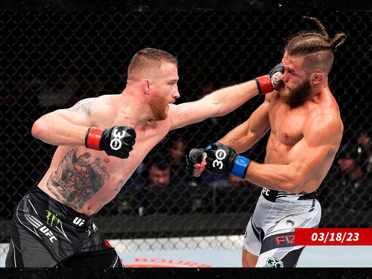 a88e65ba32b946f4b662483c0f62a7be_md Justin Gaethje punches Rafael Fiziev sub getty swipe