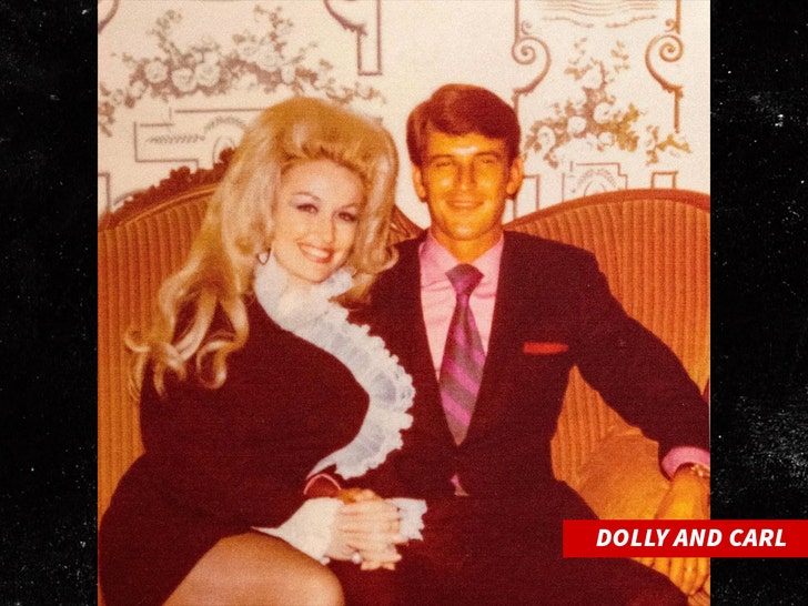 b678224f33b440748aa039593bdc3070_md Carl Dean and Dolly Parton