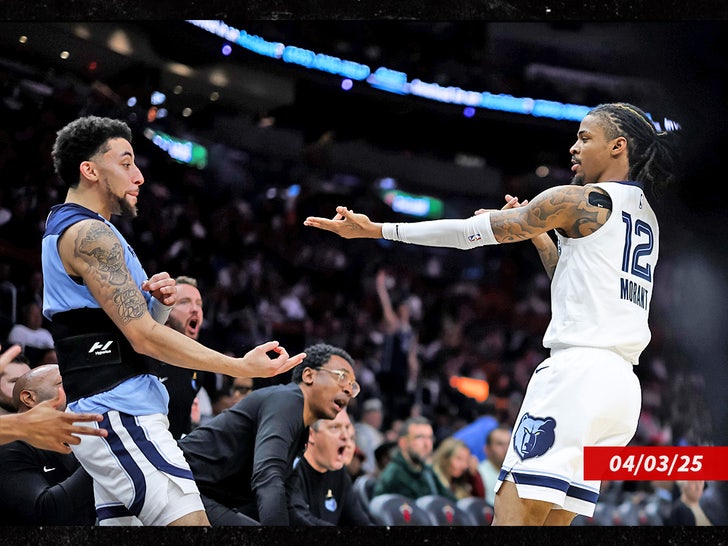 ja morant hand guns signal memphis grizzlies sub getty swipe 2