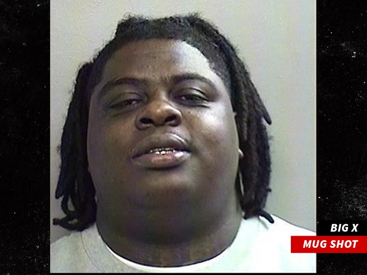bd209247b8ac4efaad4d5cdc4d904c5e_md big x mug shot