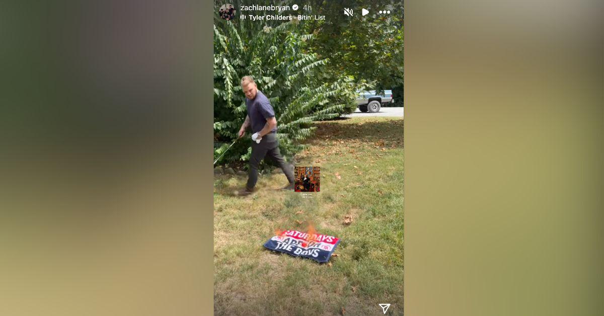 The video also featured Bryan striking the burning flag with a golf club.