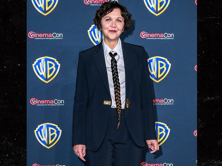 cf6f40dec390478399fe954484a66ea9_md maggie gyllenhaal CinemaCon hair tie getty