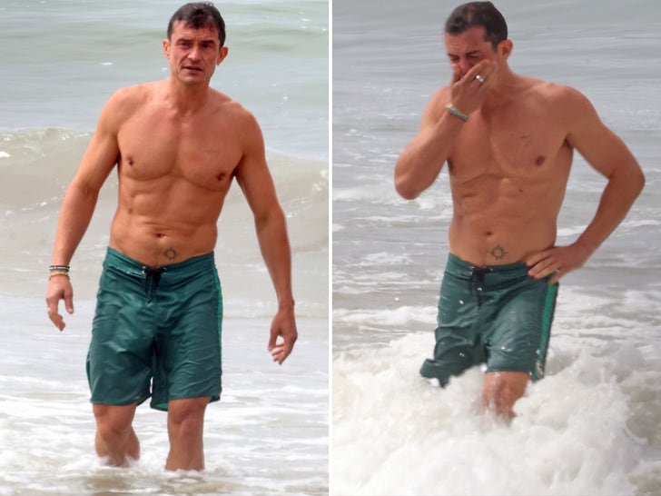 f41ec63d93834ead8d88fef5e6d3ea80_md Orlando Bloom Lookin' Hot And Shirtless As He Soaks Up The Sun!