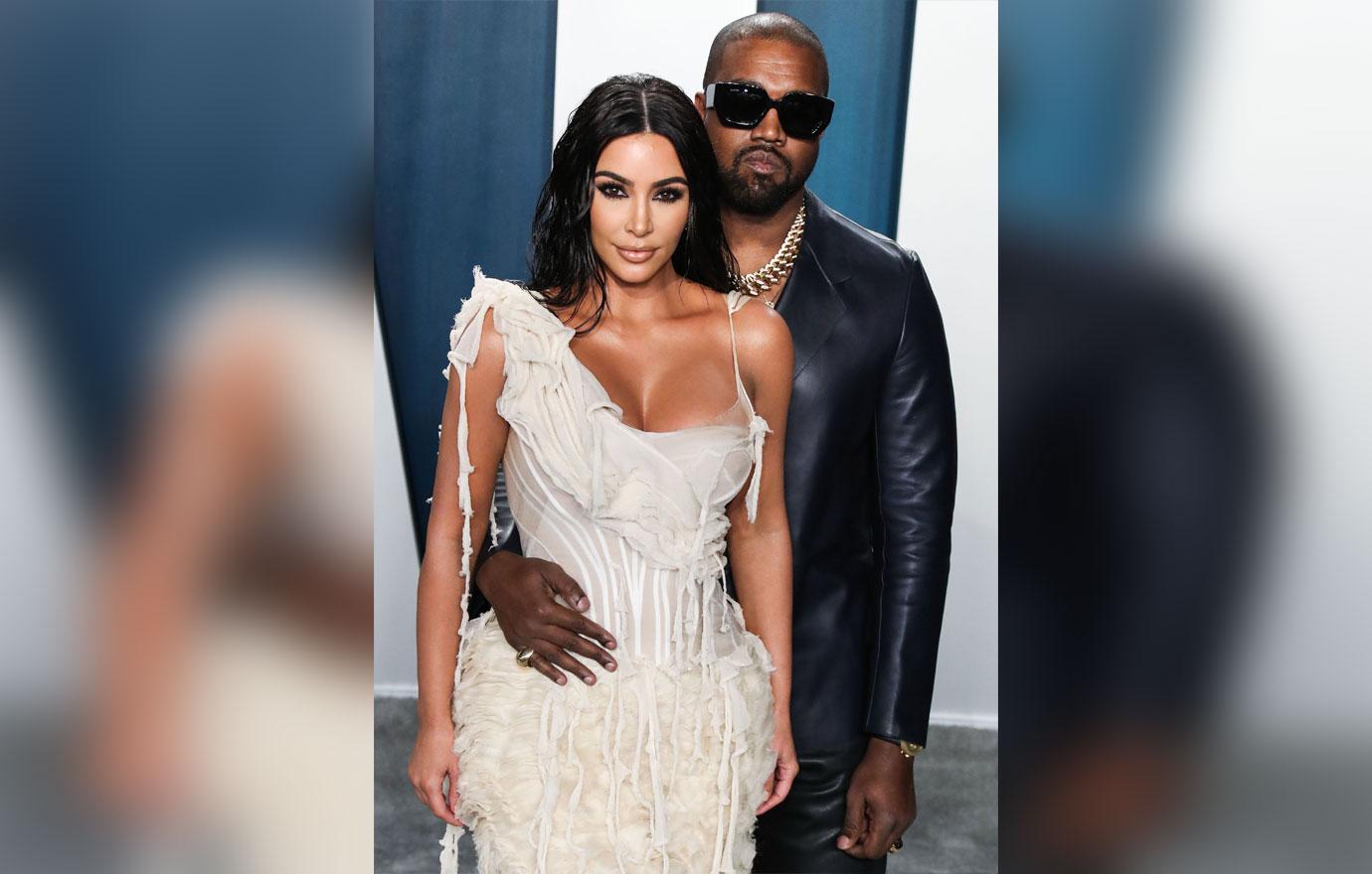 kanye-west-kim-kardashian-initials-face-mask-berlin-photos-withdraw-divorce-papers-2-1630530857659 kanye west kim kardashian initials face mask berlin photos withdraw divorce papers