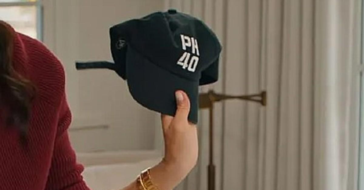 love-meghan-episode-7-meghan-ph-40-cap-closeup-1756216080173 Photo of the baseball cap Meghan Markle made for Prince Harry's 40th birthday