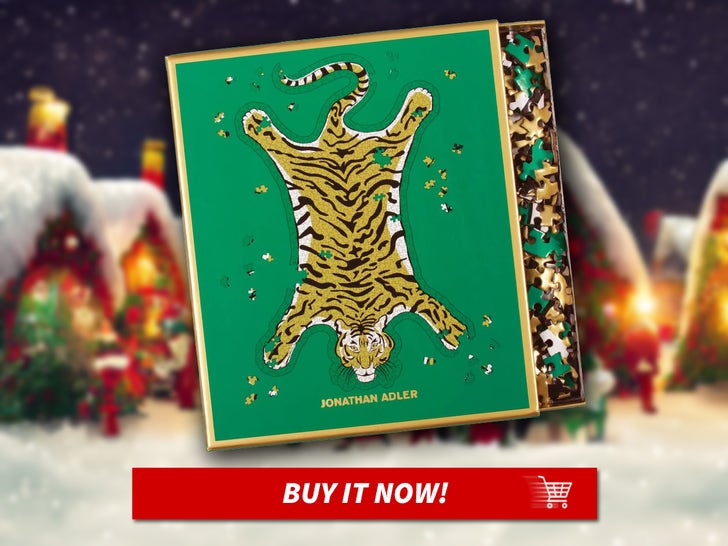 0a63631ebaa14389877961a1b00f5c26_md Galison-Jonathan-Adler-Safari-Shaped-Puzzle-MAIN