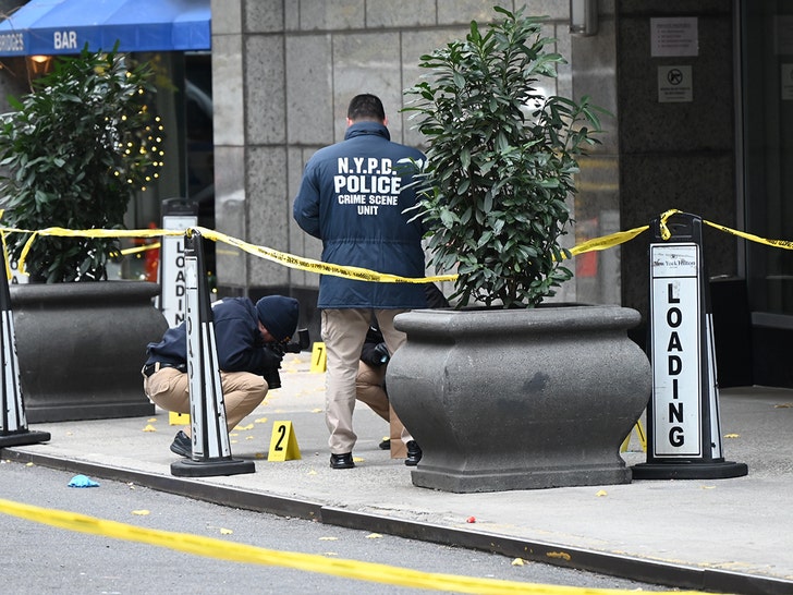 216ade11b2cf4b6b882cd30db54c3bc4_md-4 UnitedHealthcare CEO NYPD on scene of murder shell casings 9mm midtown manhattan