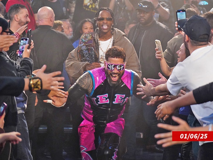 364febf1fd904742ad4e703ccfaef2ab_md jey uso travis scott wwe escorting sub getty