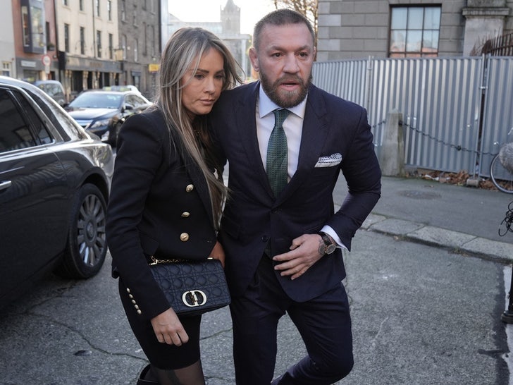 3978f77c083e439a89299db7534eb487_md-1 Conor McGregor's Wife Supports Him In Court