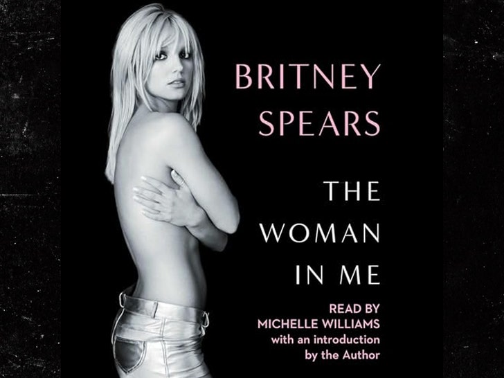 77380c8b58b54be98955557f7afb899e_md Britney Spears with her The Woman In me Book