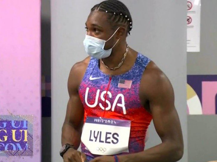 9b88cf9a52114b5abe2d7592aaca48f4_md noah lyles mask on NBC.