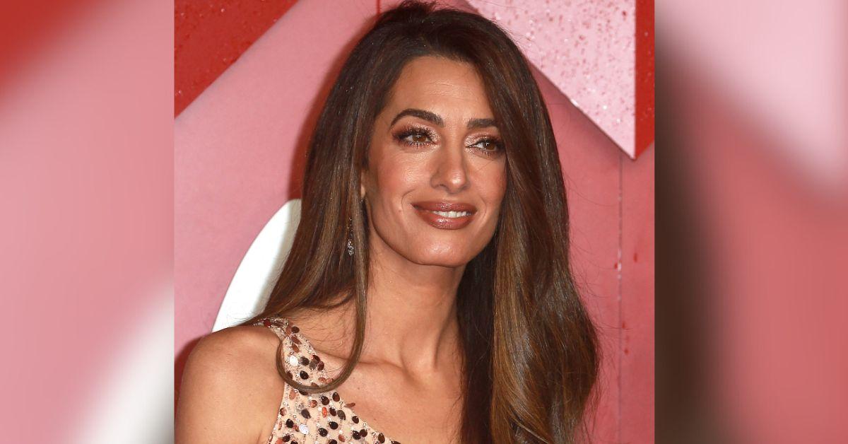 amal-clooney-fans-upset-vogue-facetuning-1763154324606 Photo of Amal Clooney