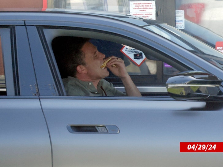 b3dc0b96c2344f73b529eae784c11b01_md Ben Affleck eating french fries inside of a car.
