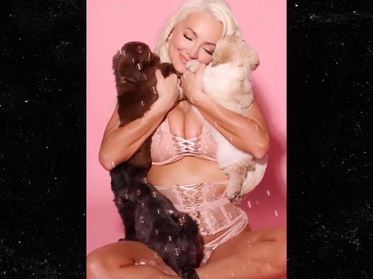 cd1ec23b84964687b6aa0d450cdd5d8d_md 1210-lindsey-pelas-calendar-photoshoot-bts-sub2_720