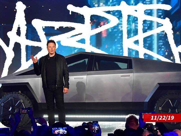 f526794c05ba44019df35e2e2fd53e54_md elon musk cybertruck