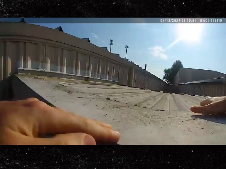 f66ed179bff241f4b57a5382a6b28467_md donald trump cops lifted on roof