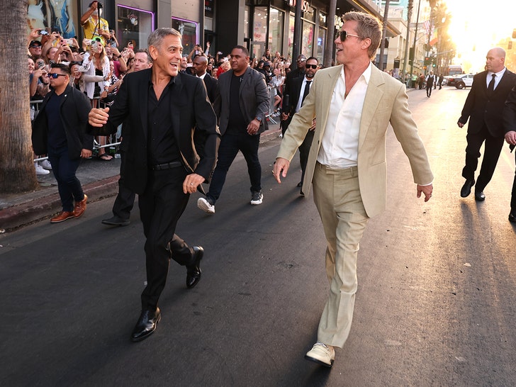 Brad Pitt and George Clooney Attend Premiere Of The Film
