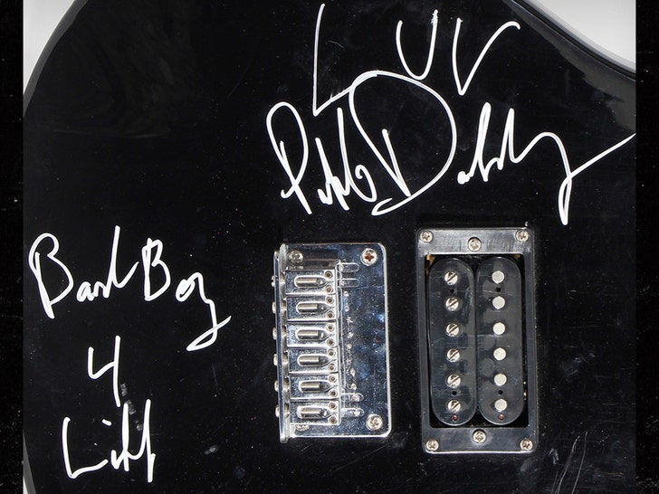 0002386d357c459f890457197823e0c4_md diddy guitar