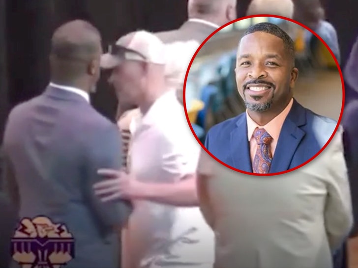 0335f8b7a2e64d24818f5e569ab247b4_md wisconsin high school dad and superintendent graduation