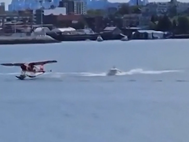 061024-plane-hits-boat-after-crash-primary