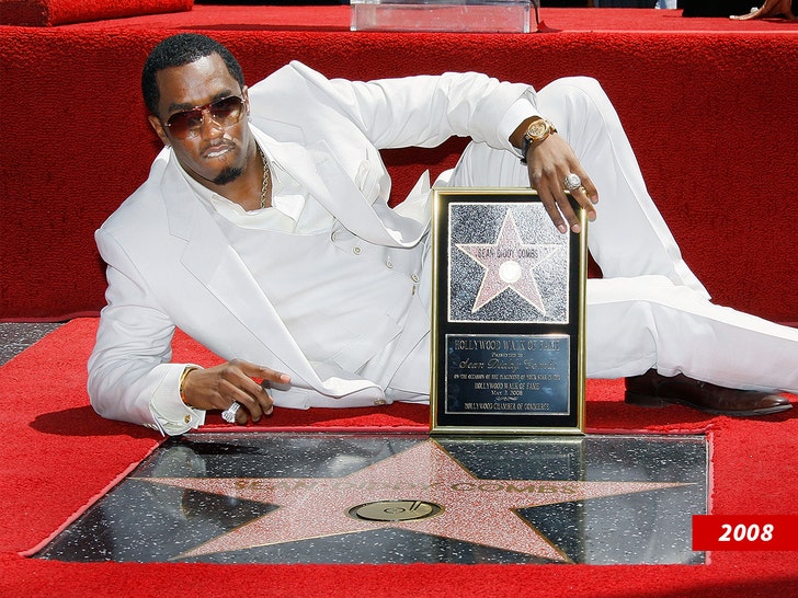 4ef656a6a9a04ba5b7d239bf2de4129a_md diddy at hollywood star ceremony