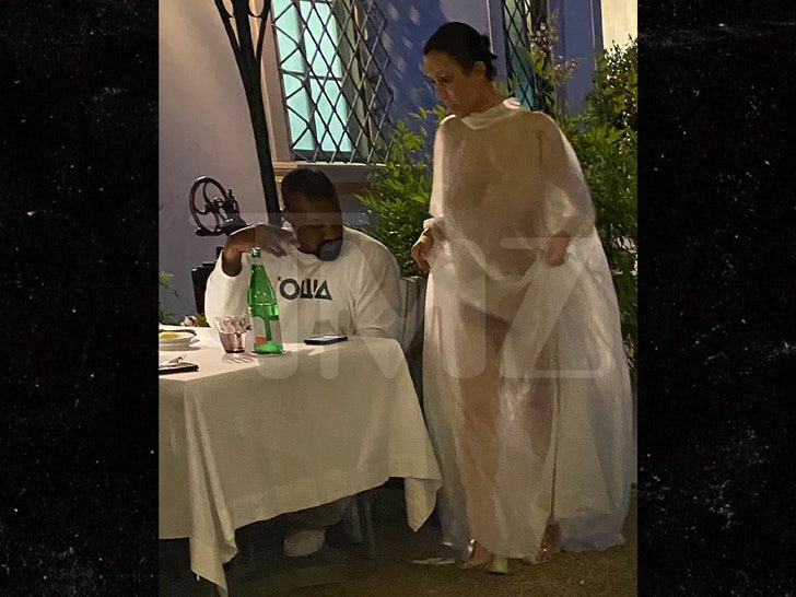 5d6f84877a684117b15ccd21c4b1e133_md kanye west bianca at dinner in Florence 2