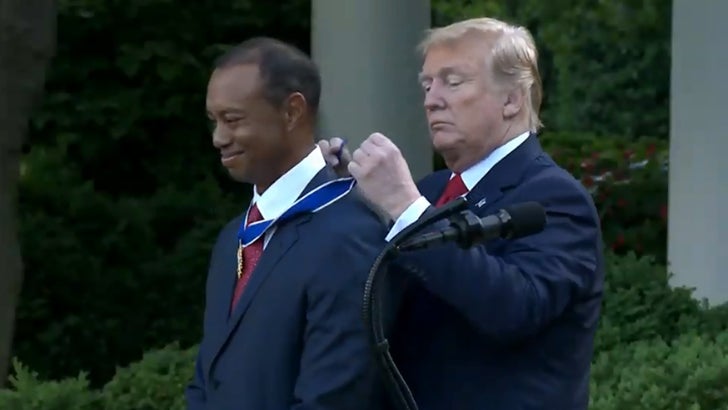 050619_donald_trump_tiger_woods_kal