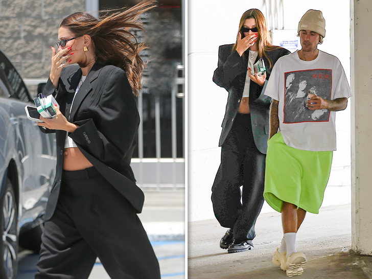 Hailey Bieber glows in crop top showing off her baby bump