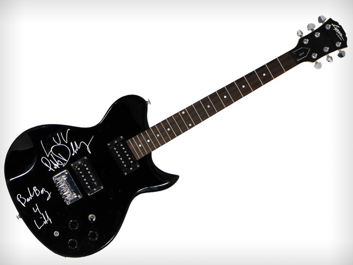 6baaab6f2c3c4d21a1ec11349c9084fa_md diddy guitar